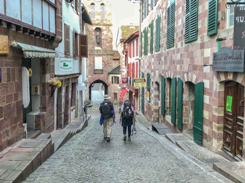 The Camino Frances in St Jean Pied de Port with two hikers.