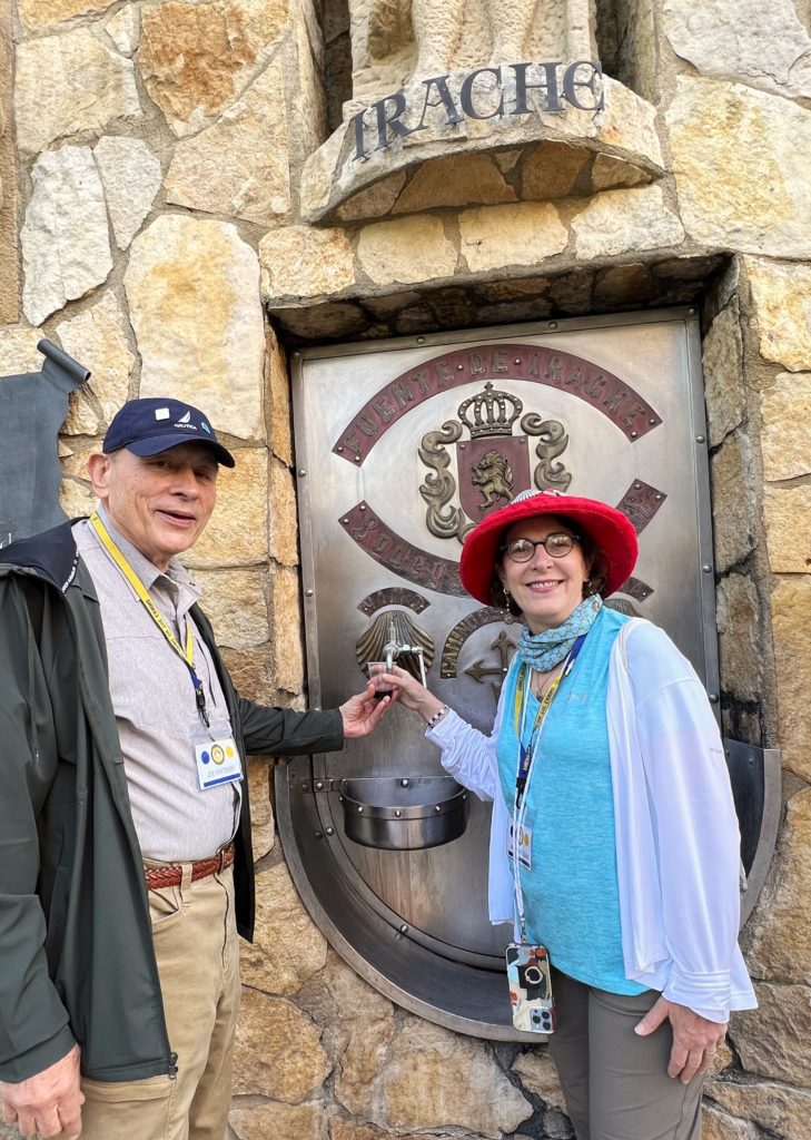 Maryjane and Joe at the famous pilgrims' wine fountain at the vineyards of Irache.