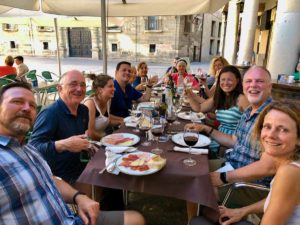 James Brooks meal in Astorga, group eating dinner.