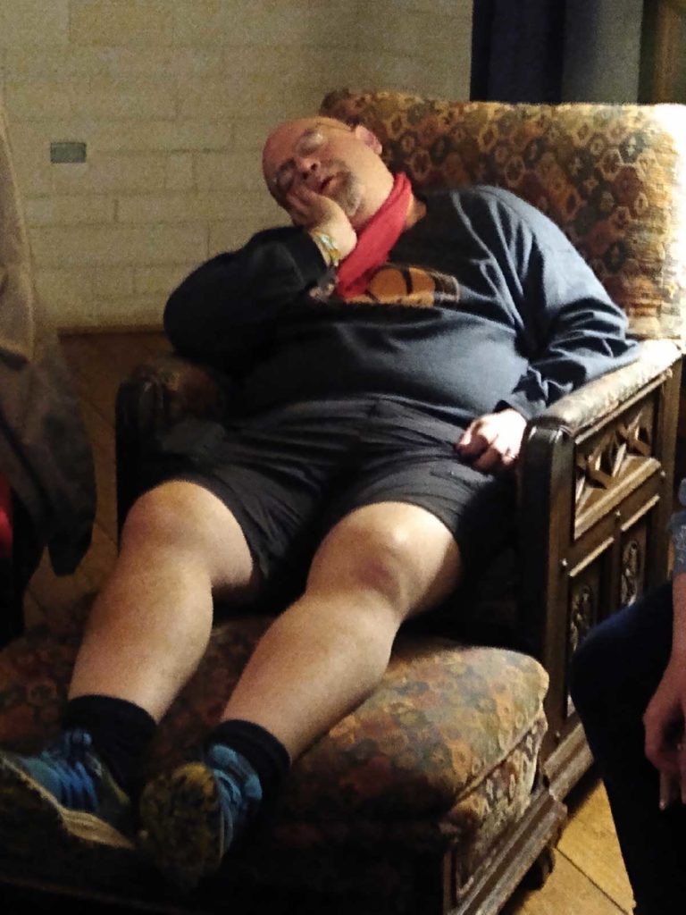 Joe Curro Dozing after Gathering, man in easy chair sleeping.