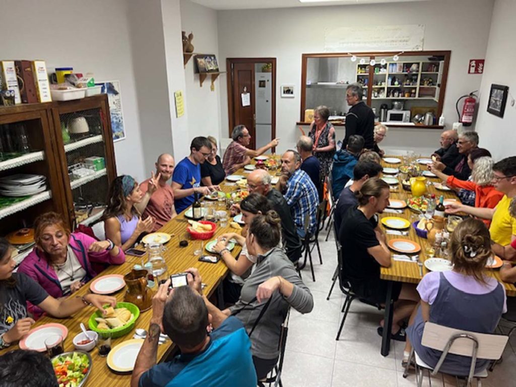 Recuerdos of the heart Mastini, autumn 2024 la concha, pilgrims eating dinner.