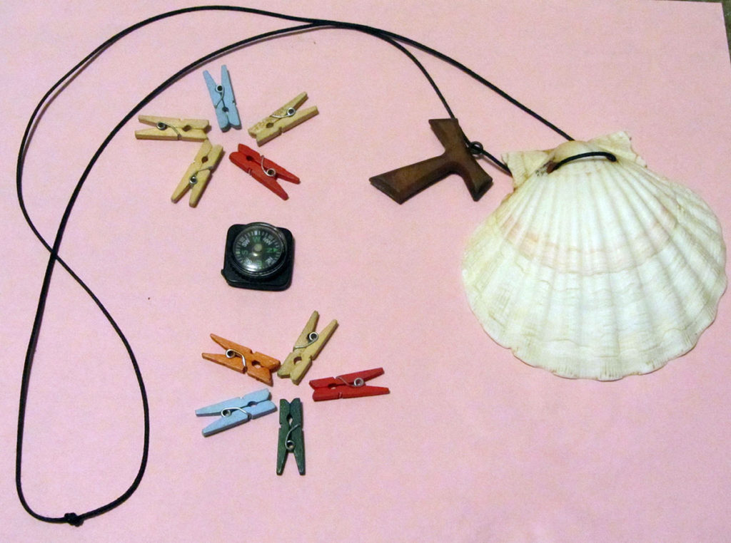 The tangible items Winter autumn 2024 la concha, shell necklace and clothes pins.